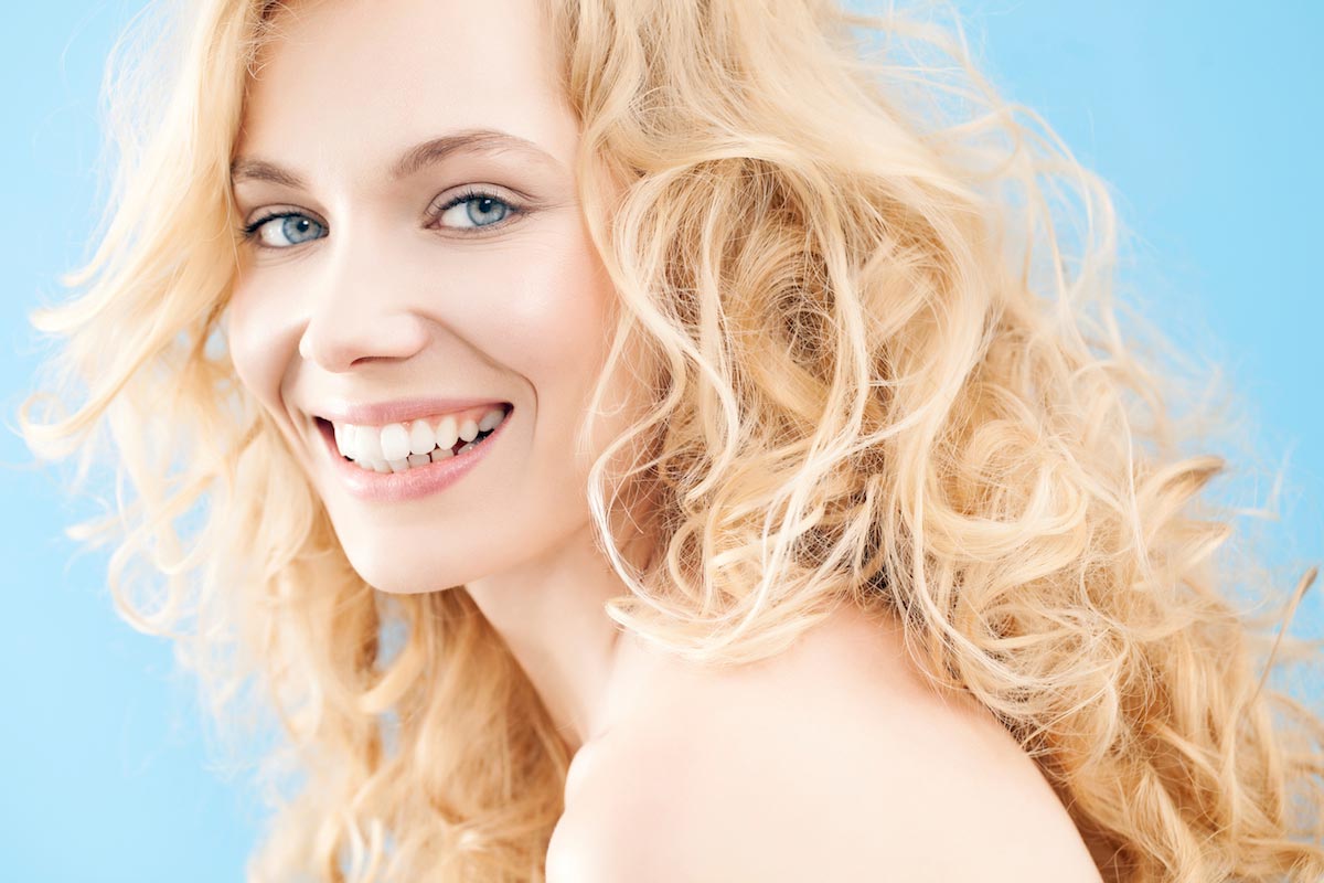 Blonde-Woman-Curls-Smile-Happy