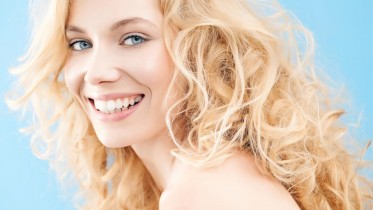 Blonde-Woman-Curls-Smile-Happy